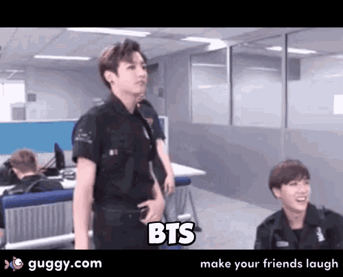 a man in a police uniform is standing next to another man with the word bts on the bottom