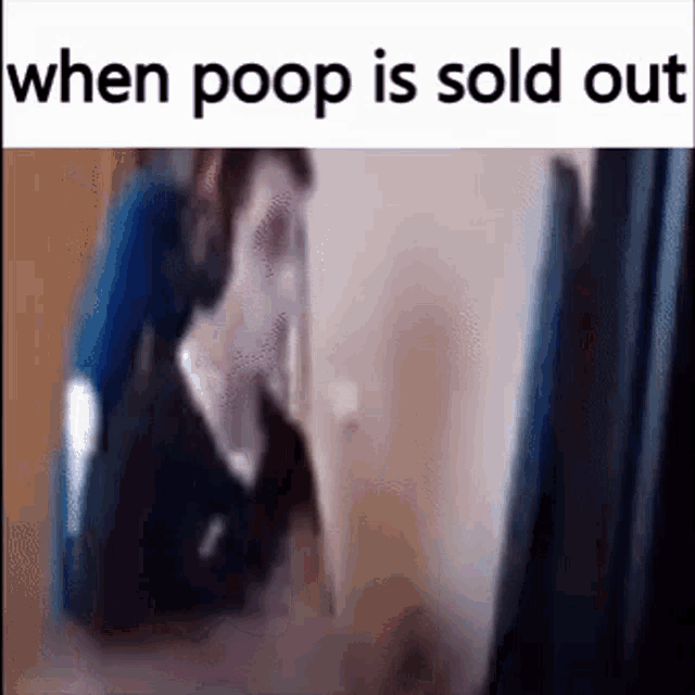 a blurry picture of a person standing next to a wall with the words `` when poop is sold out '' .