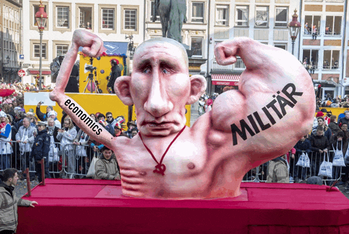 a statue of a man with the word military written on his arm