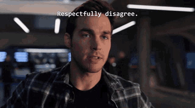 a man in a plaid shirt says respectfully disagree on a screen behind him