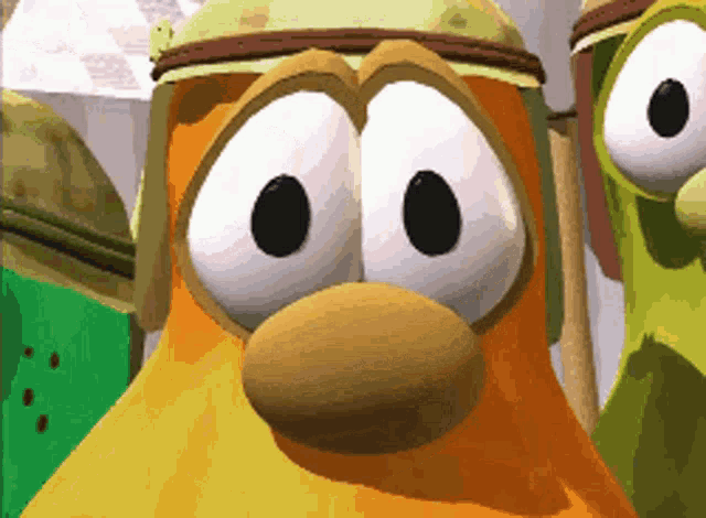 a close up of a cartoon character 's face with large eyes