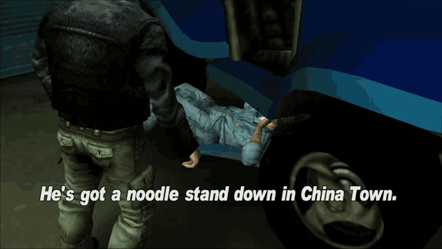 a man is standing next to a man laying under a truck with the words he 's got a noodle stand down in china town