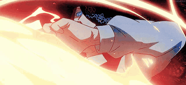 a close up of a person 's fist with a glowing circle around it