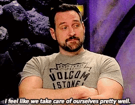 a man with a beard wearing a grey volcom t-shirt says i feel like we take care of ourselves pretty well