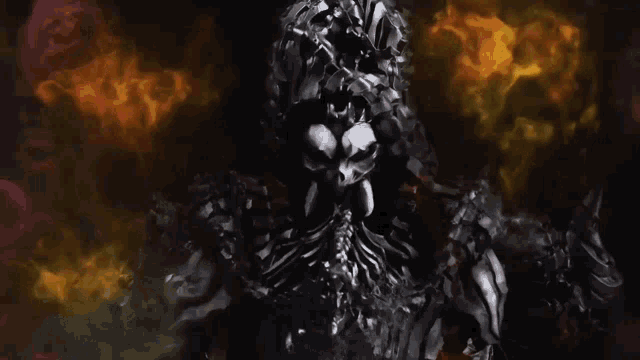 a skeleton with red eyes is surrounded by smoke and fire