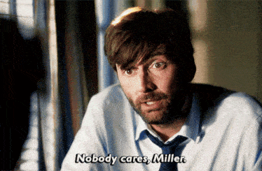 a man says nobody cares miller while wearing a blue shirt and tie
