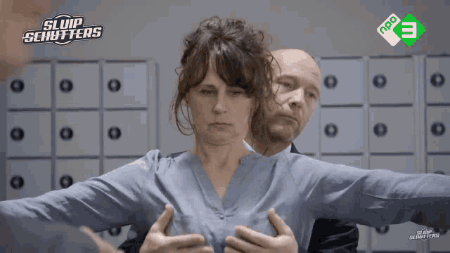 a man is touching a woman 's breast in a sloop schutters advertisement