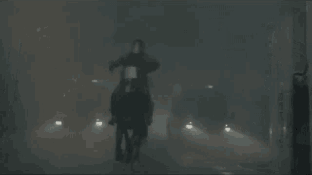 a man on a horse is being escorted by riot police