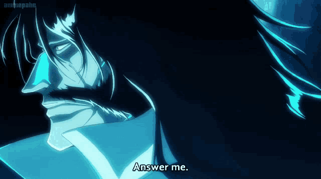 a man with long hair says answer me in a dark room