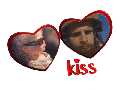 two red hearts with a picture of a man and a little girl and the word kiss