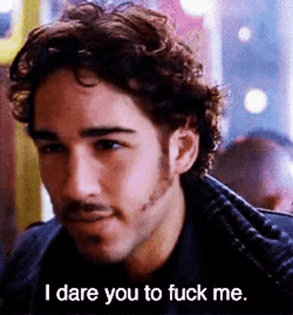 a man with a beard and curly hair says i dare you to fuck me