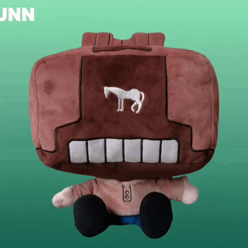 a stuffed animal with a horse embroidered on it 's back