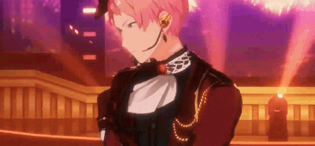 a man with pink hair is standing in front of a building in a video game and looking at the camera .