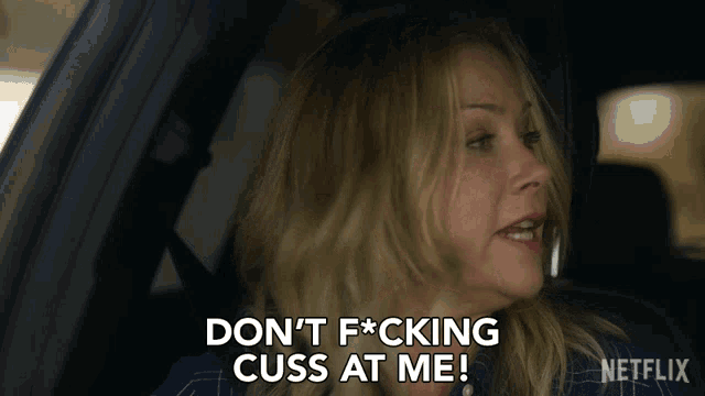 a woman in a car says " do n't f*cking cuss at me "