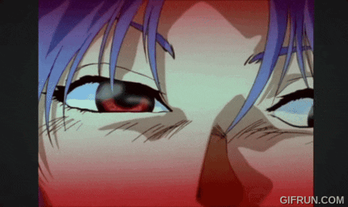 a close up of a person 's eyes with the website gifrun.com visible