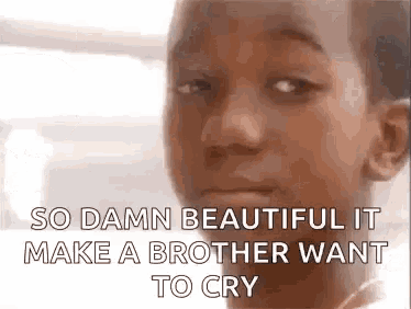 a close up of a young boy 's face with the words `` so damn beautiful it make a brother want to cry '' .