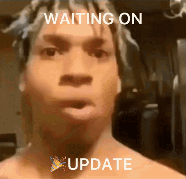 a close up of a man 's face with the caption waiting on update