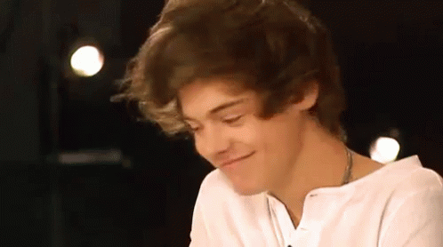 Harry Chuckling GIF - Thats Funny Laugh Harry Styles GIFs