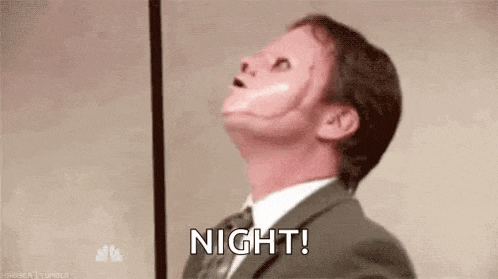 a man in a suit and tie with a bloody face is saying `` night ! ''