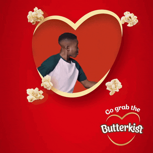 an advertisement for butterkist popcorn shows a man and a boy in a heart frame