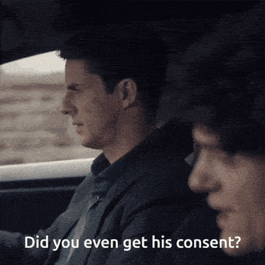a man in a suit is talking to another man in a car with the words did you even get his consent behind him
