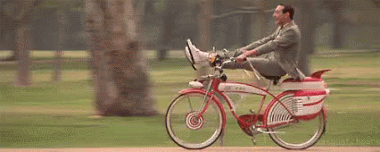 Feliz Viernes GIF - Peewee Herman Riding Bike Im Coming GIFs
