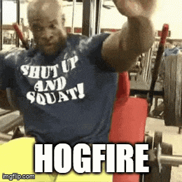 a man wearing a shirt that says " shut up and squat "