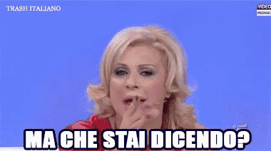 a woman says ma che stai dicendo on a blue screen