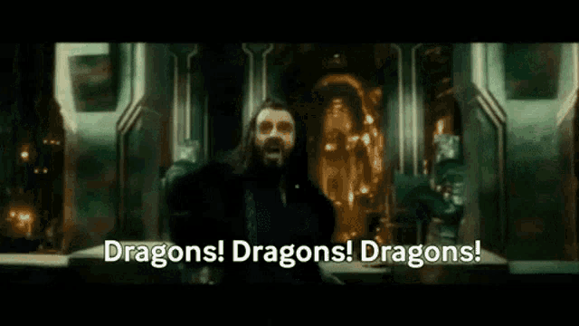 a movie scene with the words dragons ! dragons ! dragons ! written on it .