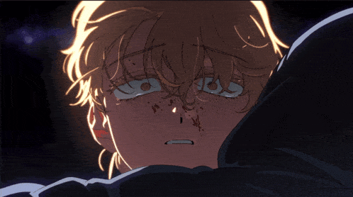 a close up of a person 's face with a tear coming out of it