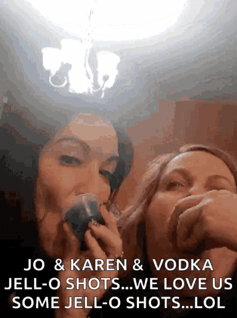 two women drinking vodka and jell-o shots with the caption jo and karen & vodka jell-o shots