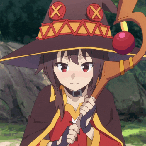 a girl wearing a witch hat with x on it