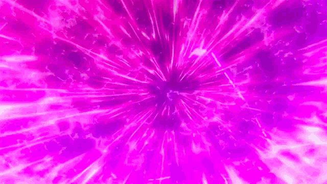 a purple fireworks display is going off in the sky