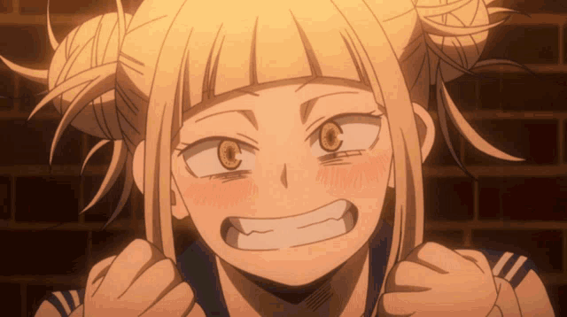 a close up of a girl with pigtails on her hair