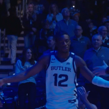 a basketball player wearing a butler jersey with the number 12 on it