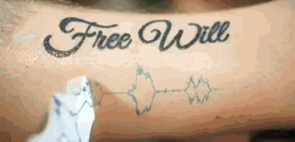 a person has a tattoo on their leg that says free will