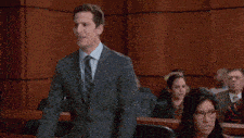 a man in a suit and tie is surrounded by the words cool