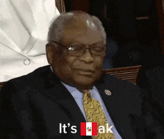 a man in a suit and tie is saying it 's ok