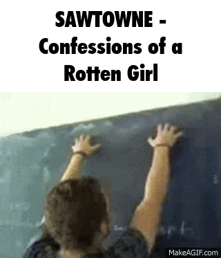 a person is leaning against a blackboard with their hands .