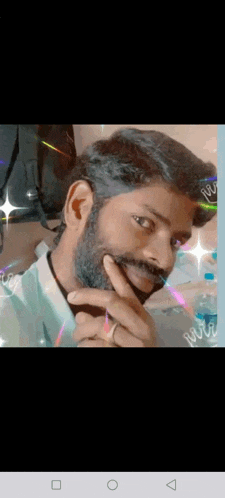 a man with a beard and mustache is taking a selfie with his finger on his chin .