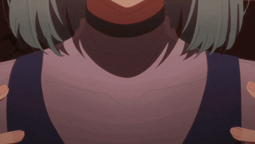 a close up of a person 's hands on a breast