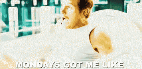 a man in a white tank top is doing exercises in a gym and says monday 's got me like
