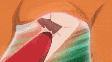 a close up of a person 's mouth with a red tongue coming out of it .