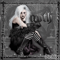 a goth girl is sitting on a couch with candles in the background .