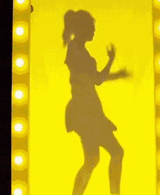 a shadow of a woman is cast on a yellow background with a question mark in the corner