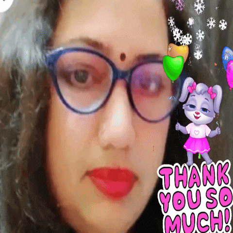 a woman wearing glasses is holding a balloon and says thank you so much