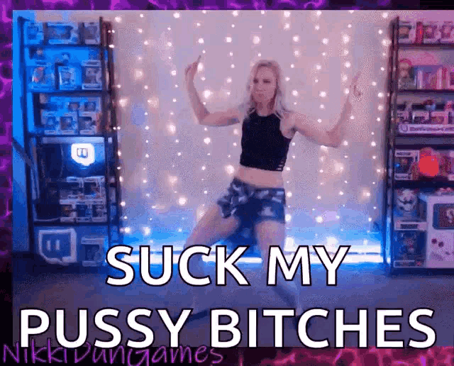 a woman is dancing with the words suck my pussy bitches