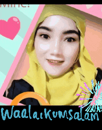 a woman wearing a yellow scarf with the words waala kumsalam written below her