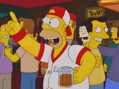 homer simpson is holding a mug of beer and pointing