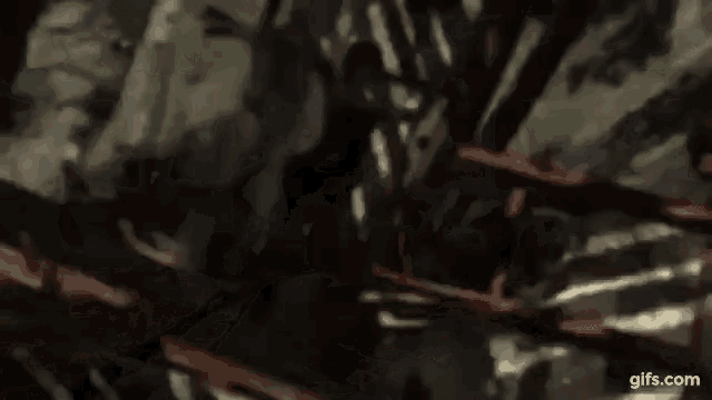 a close up of a painting of a person standing in a forest .